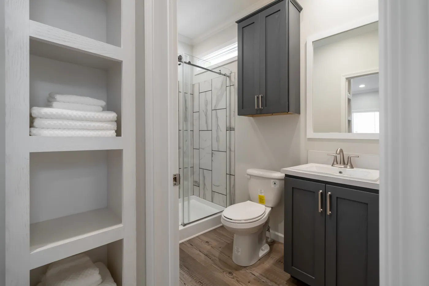 The TIFFANY Primary Bathroom. This Manufactured Mobile Home features 2 bedrooms and 2 baths.