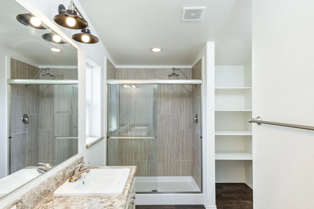 The 2017 COLUMBIA RIVER (NEW) Primary Bathroom. This Manufactured Mobile Home features 3 bedrooms and 2 baths.