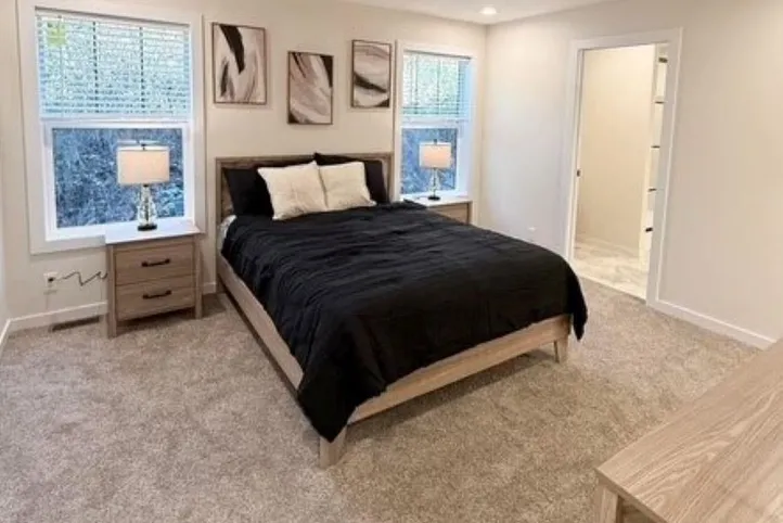 The TOMPKINS BLVD/6428-MS029-1 SEC Primary Bedroom. This Manufactured Mobile Home features 3 bedrooms and 2 baths.