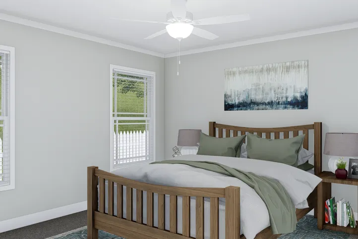 The THE BREEZE Primary Bedroom. This Manufactured Mobile Home features 3 bedrooms and 2 baths.
