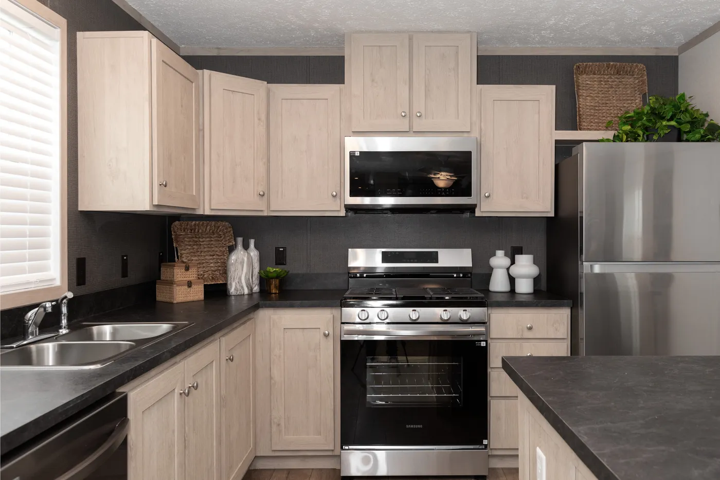 The 7616-4200 ADRENALINE Kitchen. This Manufactured Mobile Home features 3 bedrooms and 2 baths.