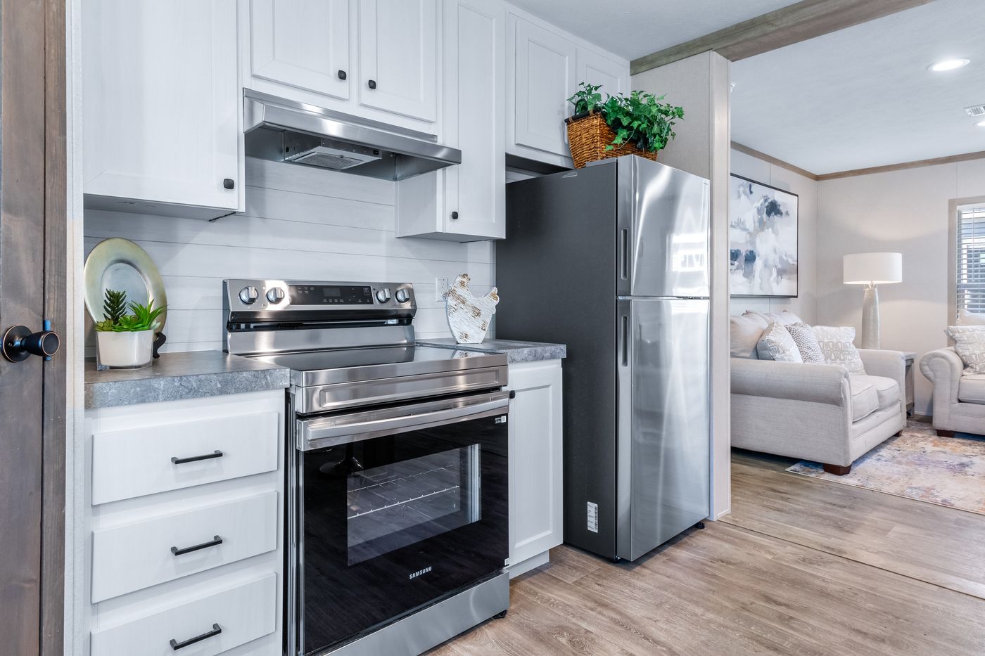 The PT 78 Kitchen. This Manufactured Mobile Home features 3 bedrooms and 2 baths.