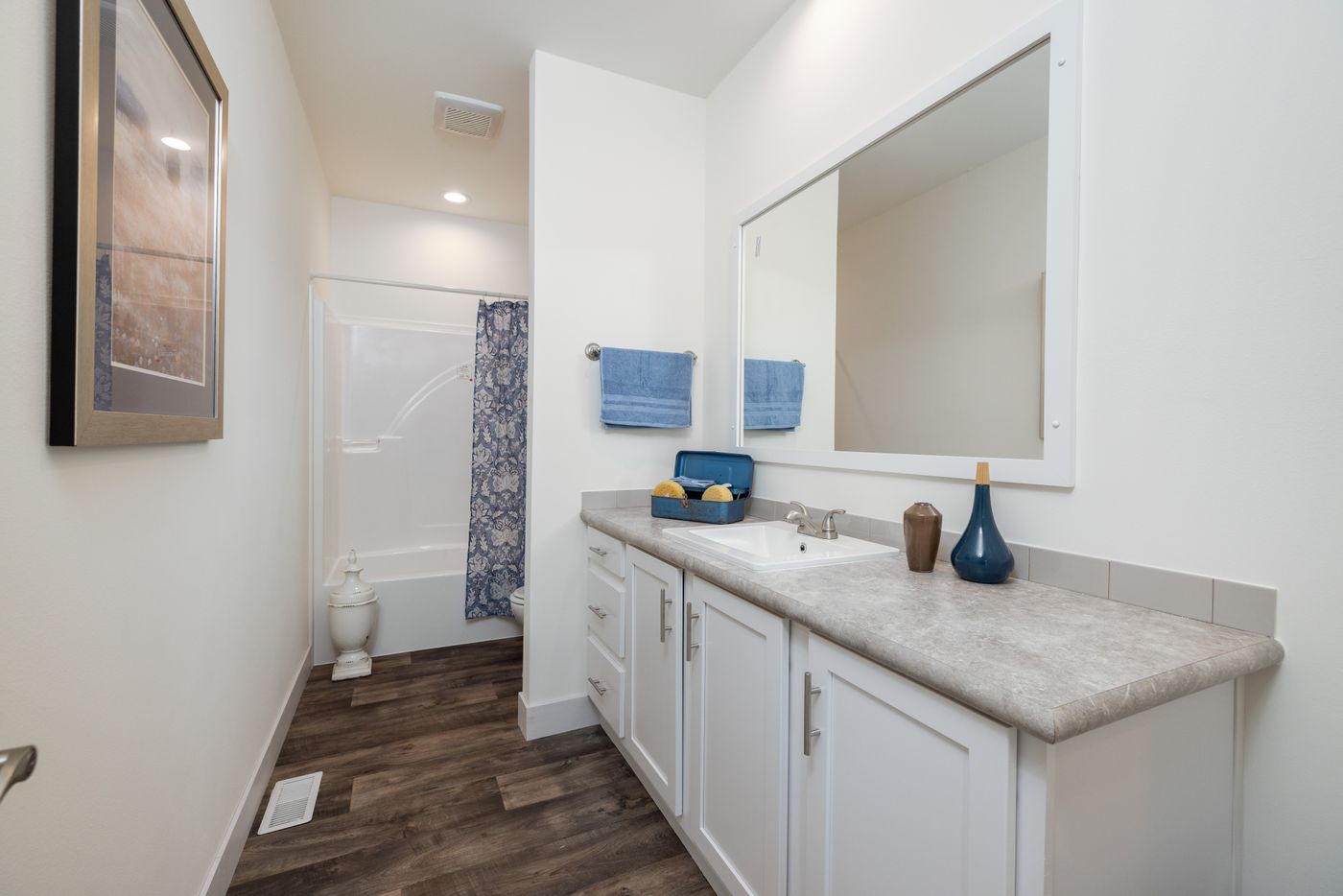 The 50TH ANNIVERSARY Guest Bathroom. This Manufactured Mobile Home features 3 bedrooms and 2 baths.