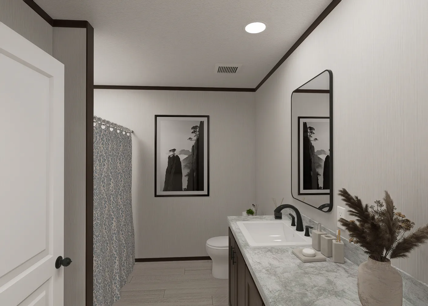 The SAPPHIRE Guest Bathroom. This Manufactured Mobile Home features 4 bedrooms and 2 baths.