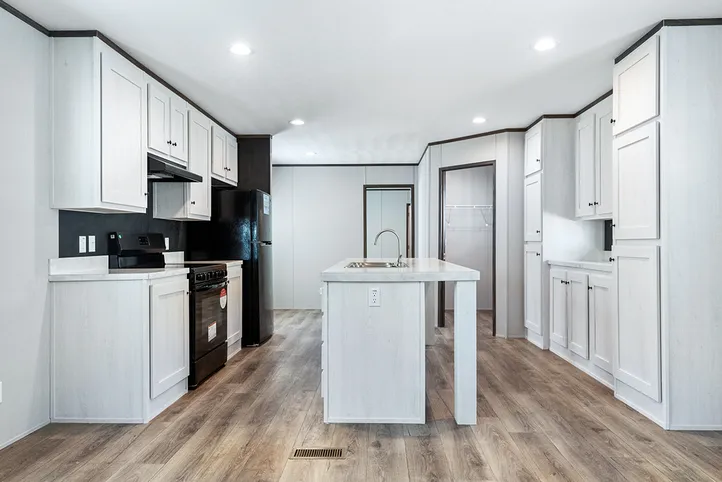 The SELECT 16723B Kitchen. This Manufactured Mobile Home features 3 bedrooms and 2 baths.