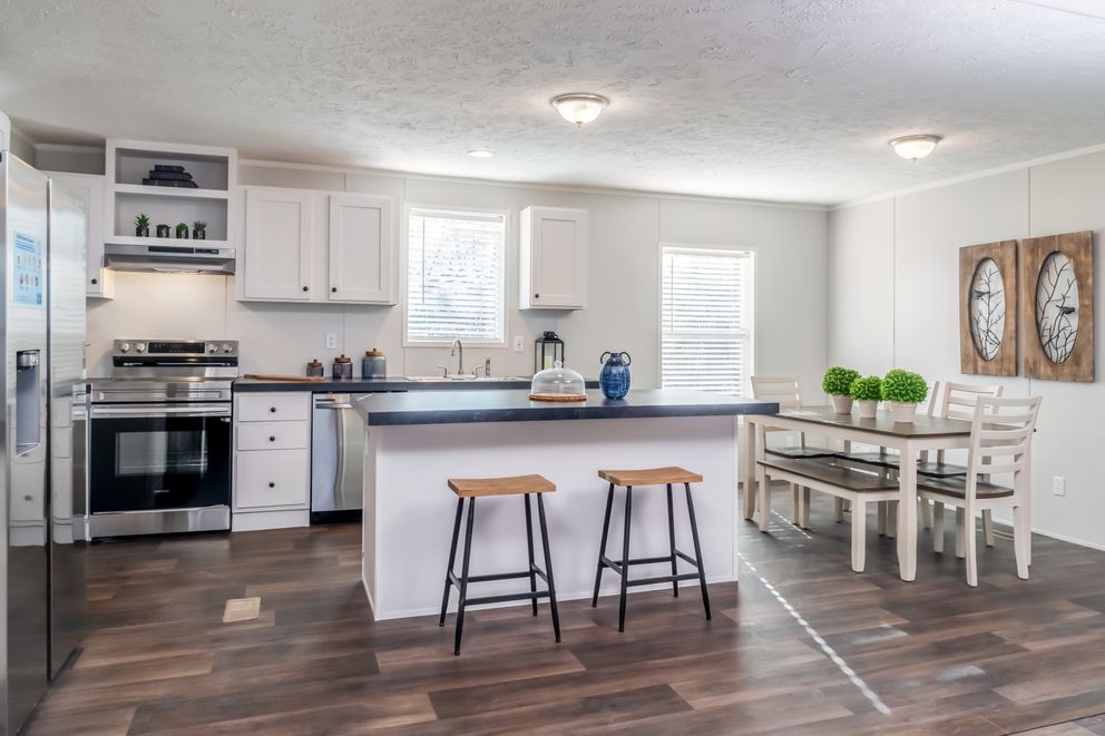 The THE EAGLE 48 Kitchen. This Manufactured Mobile Home features 3 bedrooms and 2 baths.