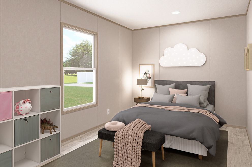 The THE EAGLE 68 Guest Bedroom. This Manufactured Mobile Home features 4 bedrooms and 2 baths.