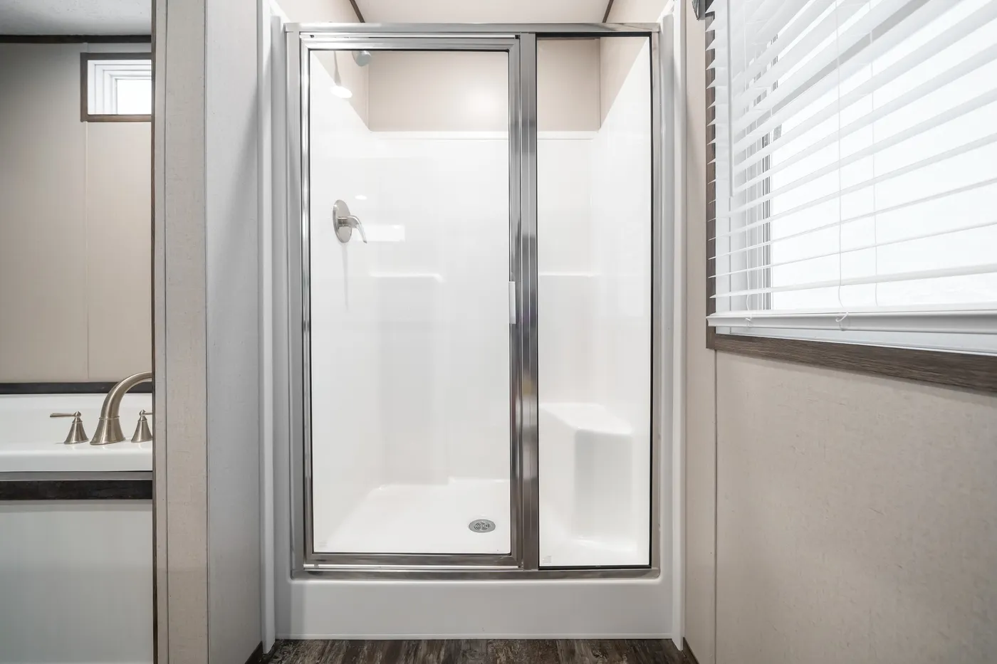 The THE GENERAL Primary Bathroom. This Manufactured Mobile Home features 3 bedrooms and 2 baths.