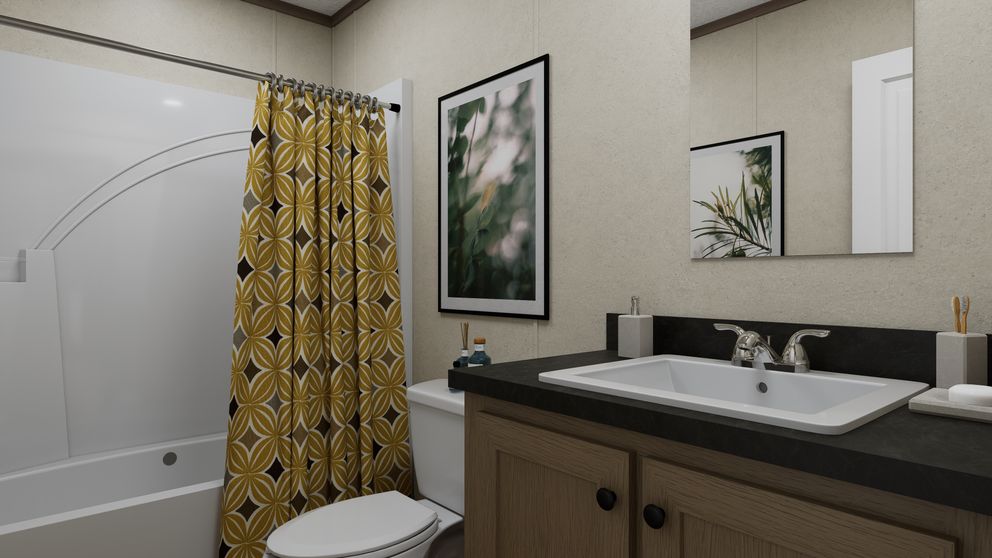 The 5228-CC51 PILLAR 52 Guest Bathroom. This Manufactured Mobile Home features 3 bedrooms and 2 baths.