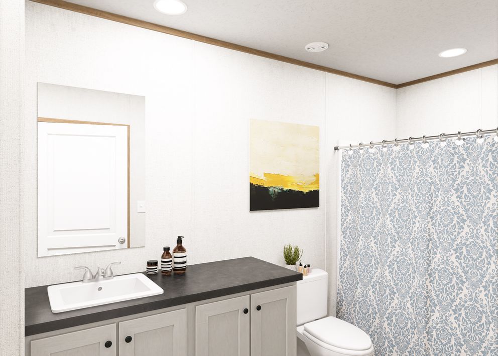 The BEACON Primary Bathroom. This Manufactured Mobile Home features 3 bedrooms and 2 baths.