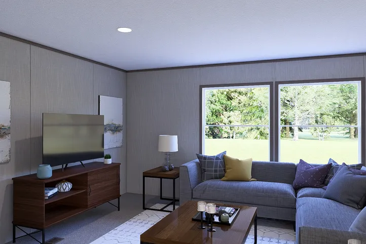 The LEGEND BIG BOY Living Room. This Manufactured Mobile Home features 4 bedrooms and 2 baths.