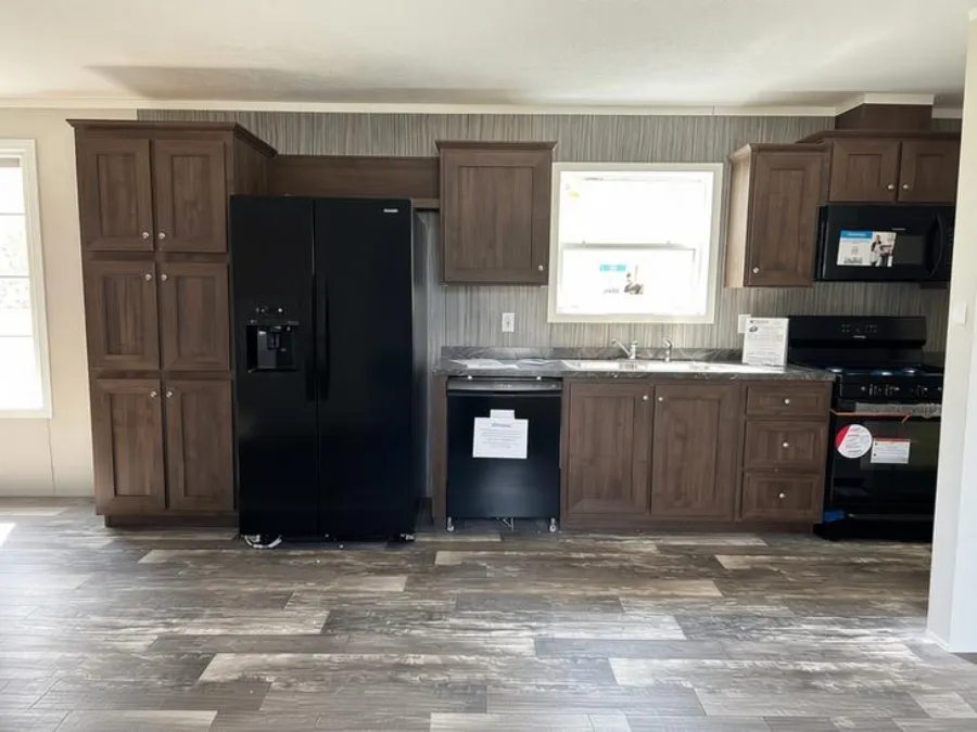 The SAPPHIRE XL 8016-644 Kitchen. This Manufactured Mobile Home features 3 bedrooms and 2 baths.