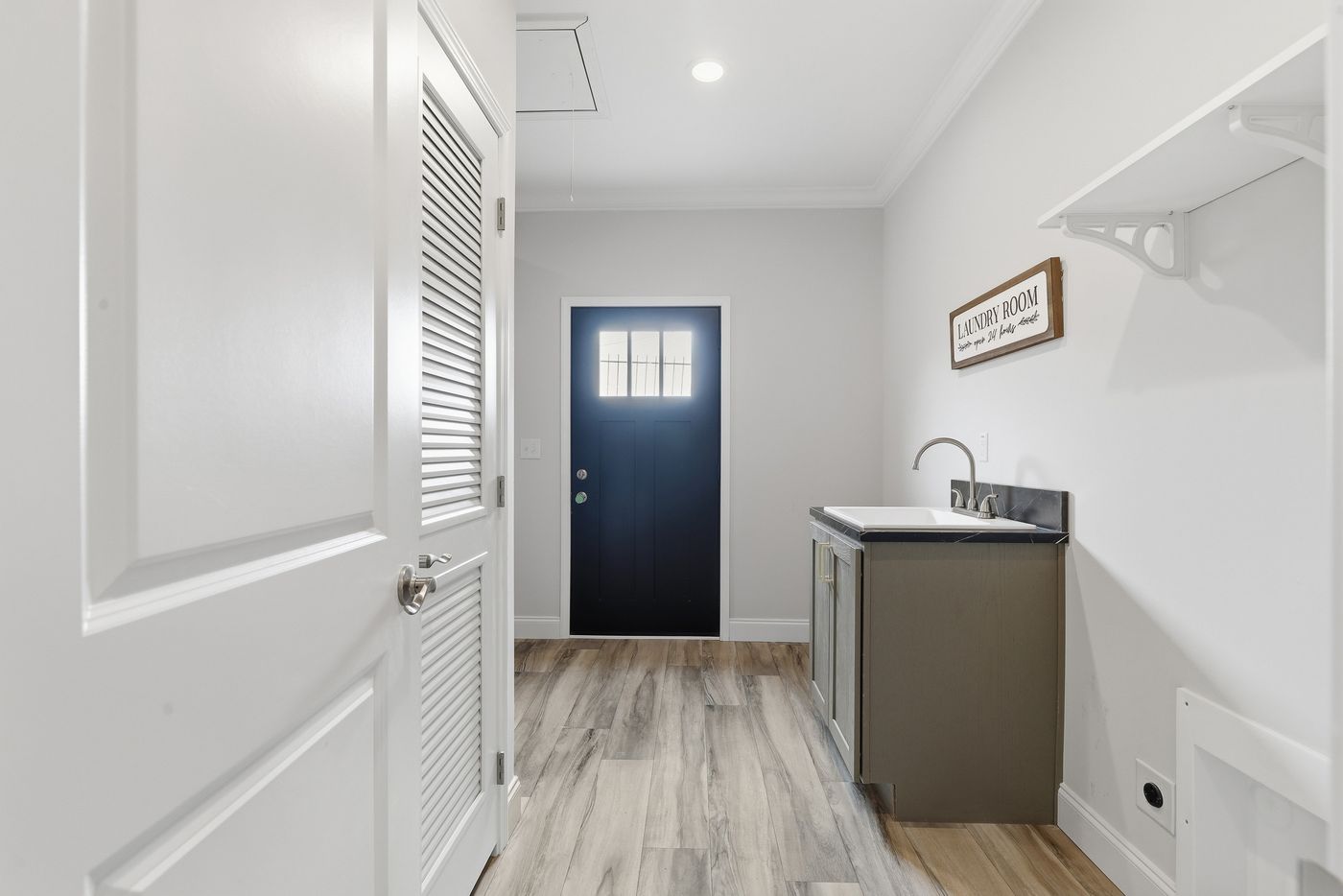 The THE SUMMIT Utility Room. This Manufactured Mobile Home features 3 bedrooms and 2 baths.