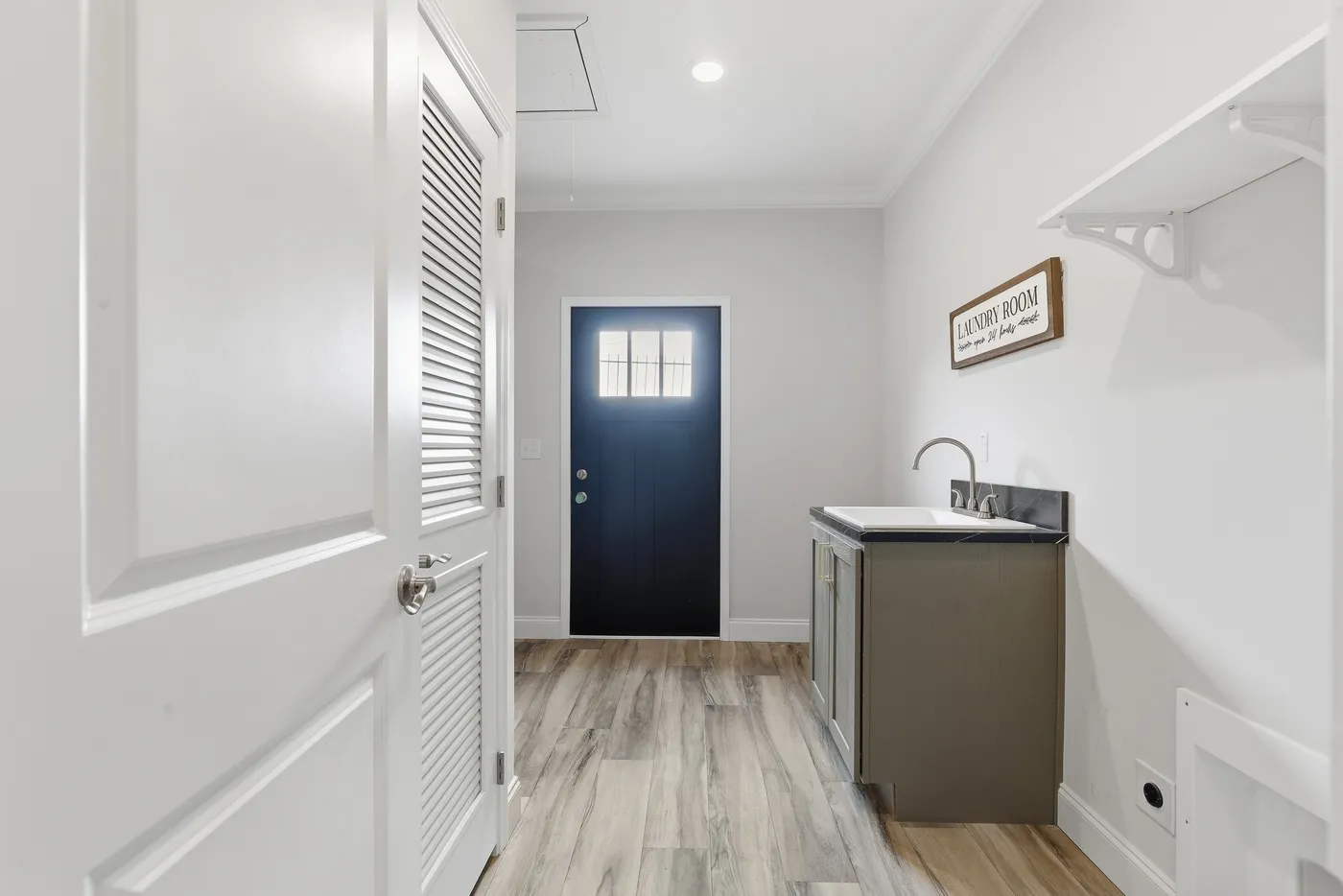 The THE SUMMIT Utility Room. This Manufactured Mobile Home features 3 bedrooms and 2 baths.