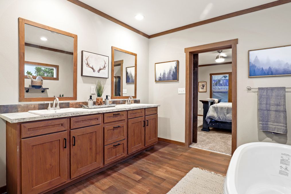 The THE DURANGO Master Bathroom. This Manufactured Mobile Home features 3 bedrooms and 2 baths.