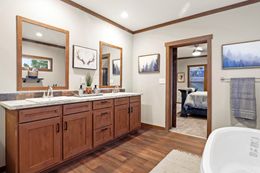 The THE DURANGO Primary Bathroom. This Manufactured Mobile Home features 3 bedrooms and 2 baths.