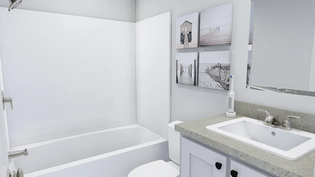 The RHYTHM NATION 6616 TEMPO Guest Bathroom. This Manufactured Mobile Home features 3 bedrooms and 2 baths.