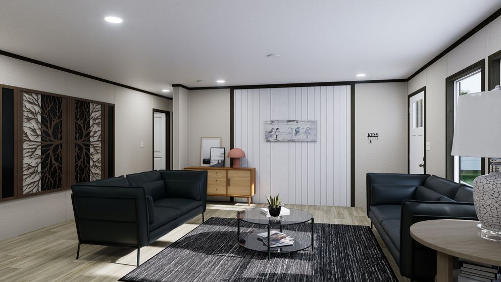 The FLOURISH Living Room. This Manufactured Mobile Home features 3 bedrooms and 2 baths.