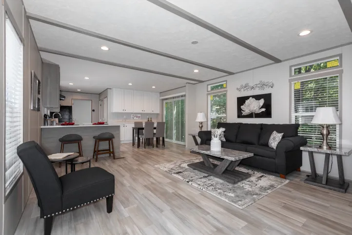 The THE ANNIVERSARY 76 Living Room. This Manufactured Mobile Home features 3 bedrooms and 2 baths.