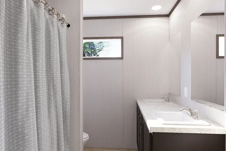 The ULTRA PRO HERCULES 28X68 3BR Guest Bathroom. This Manufactured Mobile Home features 3 bedrooms and 2 baths.