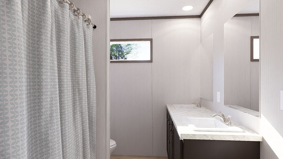 The ULTRA PRO HERCULES 28X68 3BR Guest Bathroom. This Manufactured Mobile Home features 3 bedrooms and 2 baths.