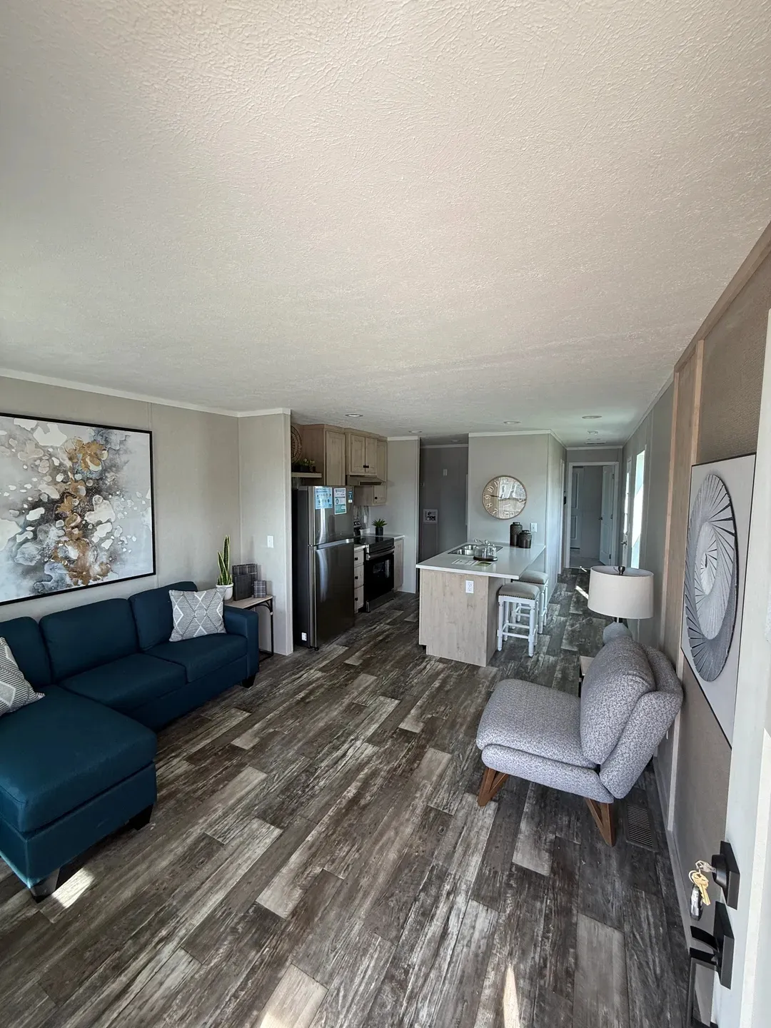 The ONYX Living Room. This Manufactured Mobile Home features 1 bedroom and 1 bath.