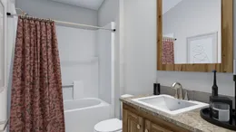 The QL604K                 CLAYTON Guest Bathroom. This Manufactured Mobile Home features 4 bedrooms and 2 baths.