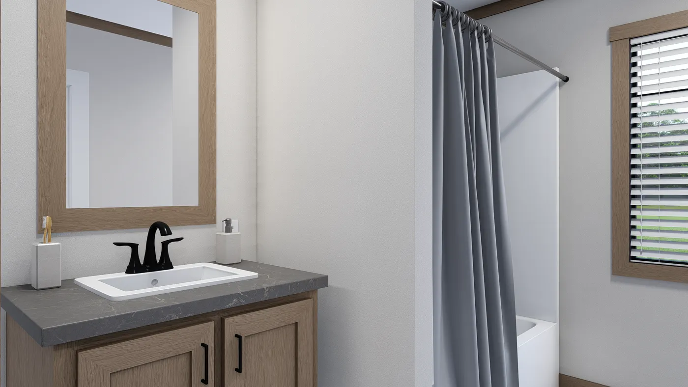 The NELLIE Guest Bathroom. This Manufactured Mobile Home features 4 bedrooms and 2 baths.