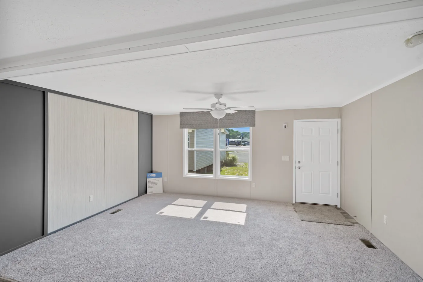 The ZIRCON Living Room. This Manufactured Mobile Home features 3 bedrooms and 2 baths.