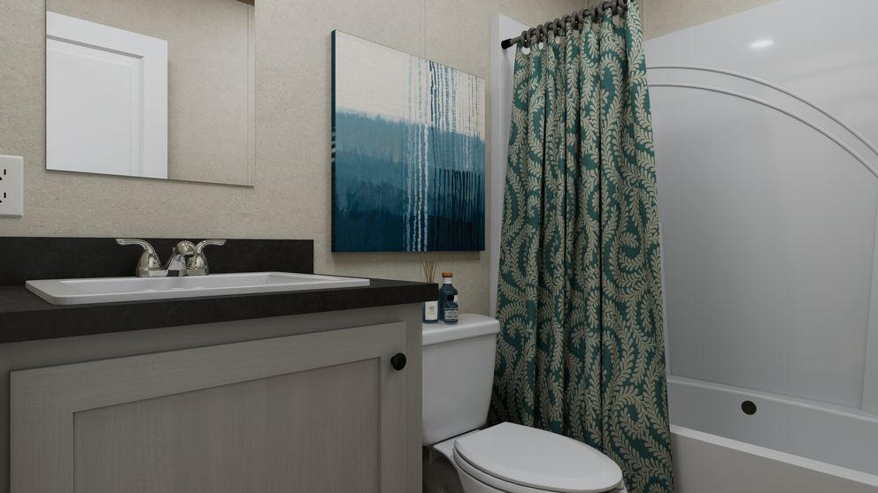 The 4824-CC54 OAKSTEAD 48 Guest Bathroom. This Manufactured Mobile Home features 3 bedrooms and 2 baths.