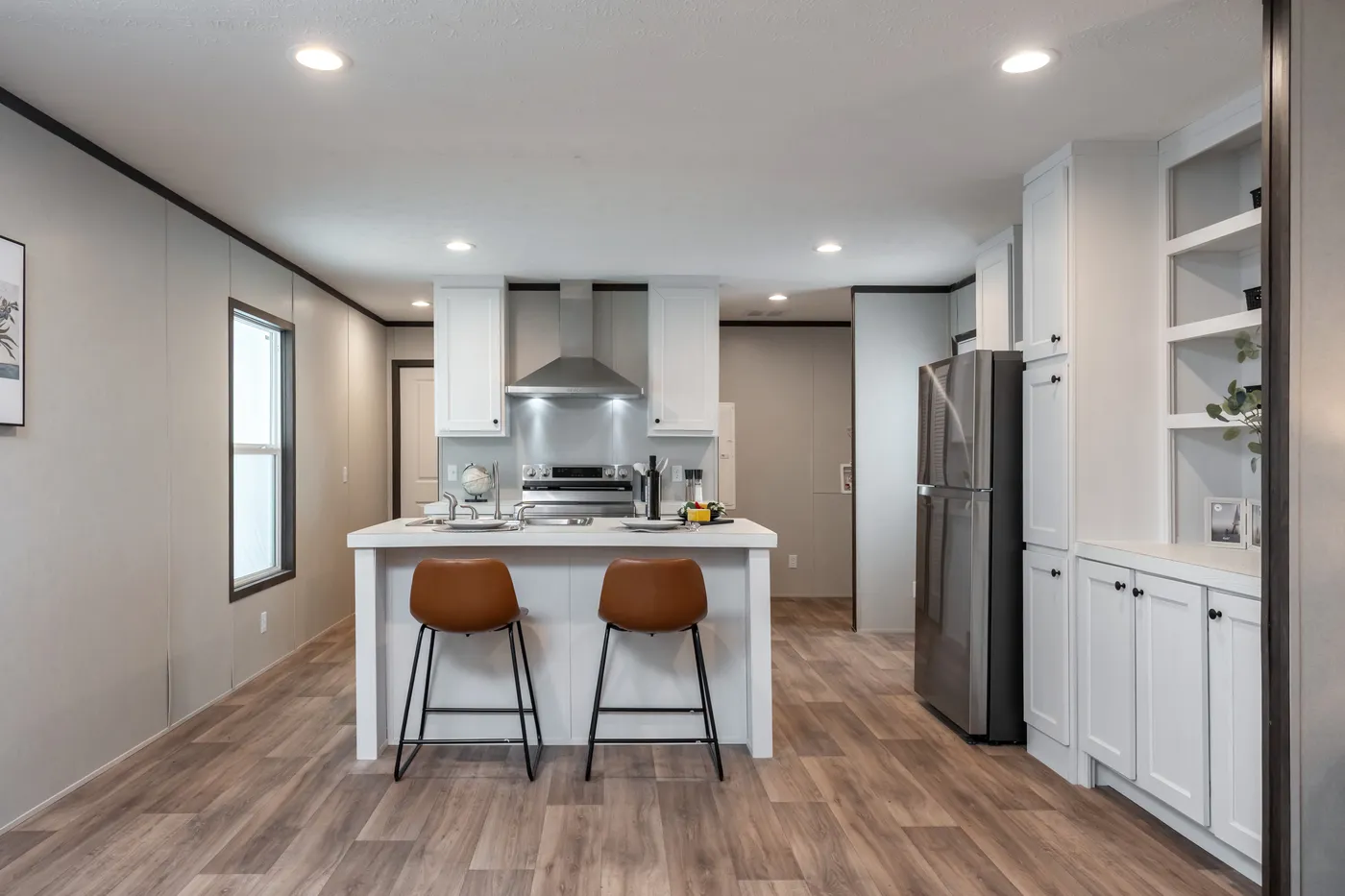 The ESSENCE Kitchen. This Manufactured Mobile Home features 3 bedrooms and 2 baths.