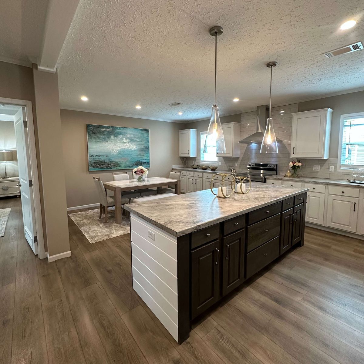 The THE HEXAGON Kitchen. This Manufactured Mobile Home features 4 bedrooms and 3 baths.