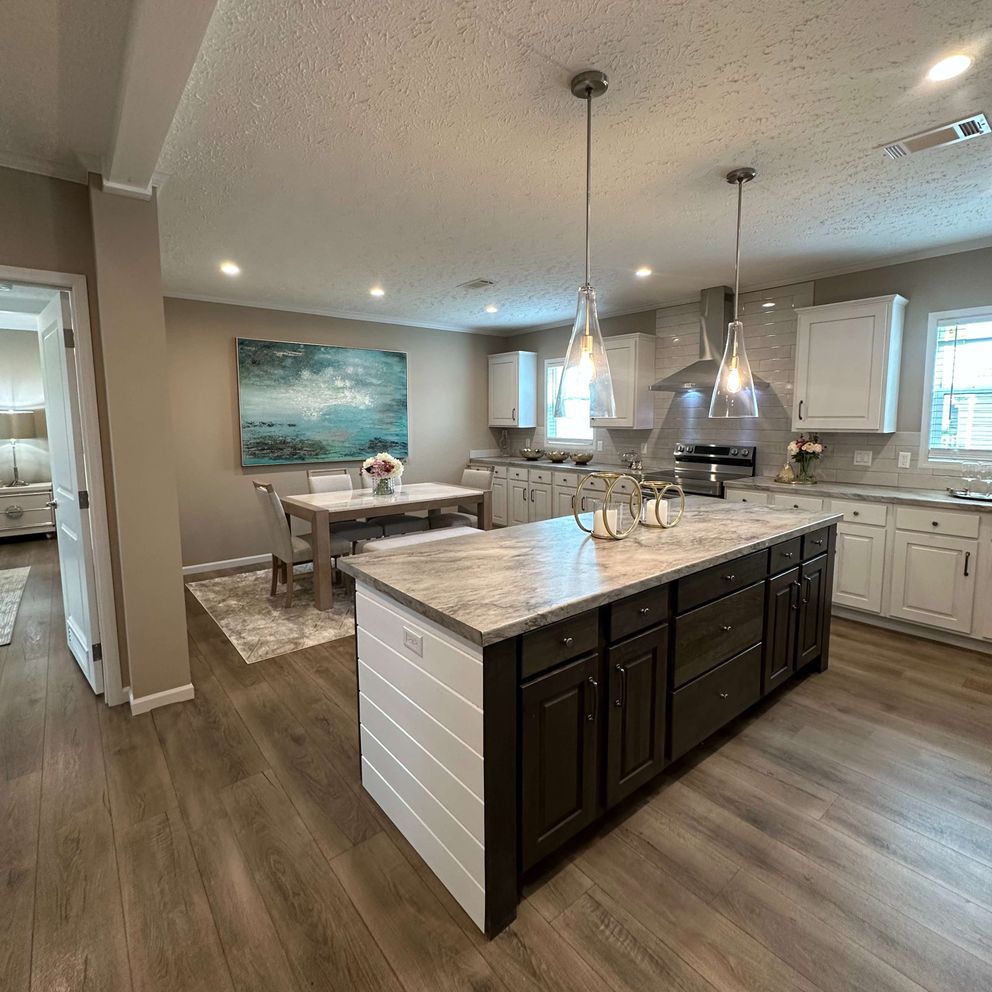 The THE HEXAGON Kitchen. This Manufactured Mobile Home features 4 bedrooms and 3 baths.