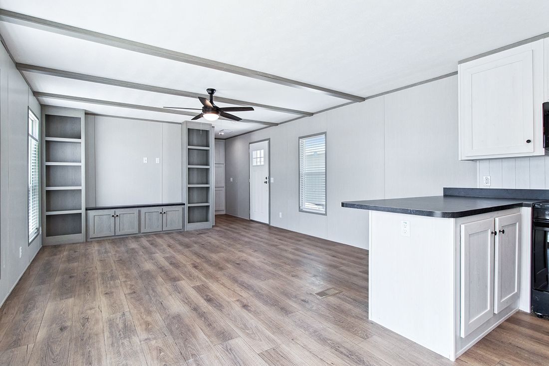 The ANNIVERSARY 16682A Living Room. This Manufactured Mobile Home features 2 bedrooms and 2 baths.