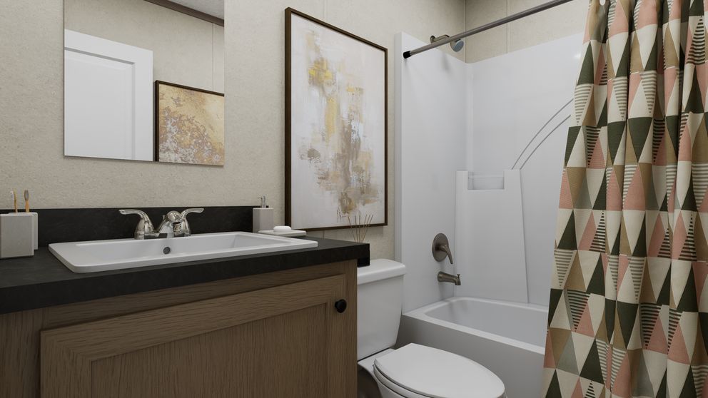 The 5616-CC01 CORNERSTONE 56 Guest Bathroom. This Manufactured Mobile Home features 2 bedrooms and 2 baths.