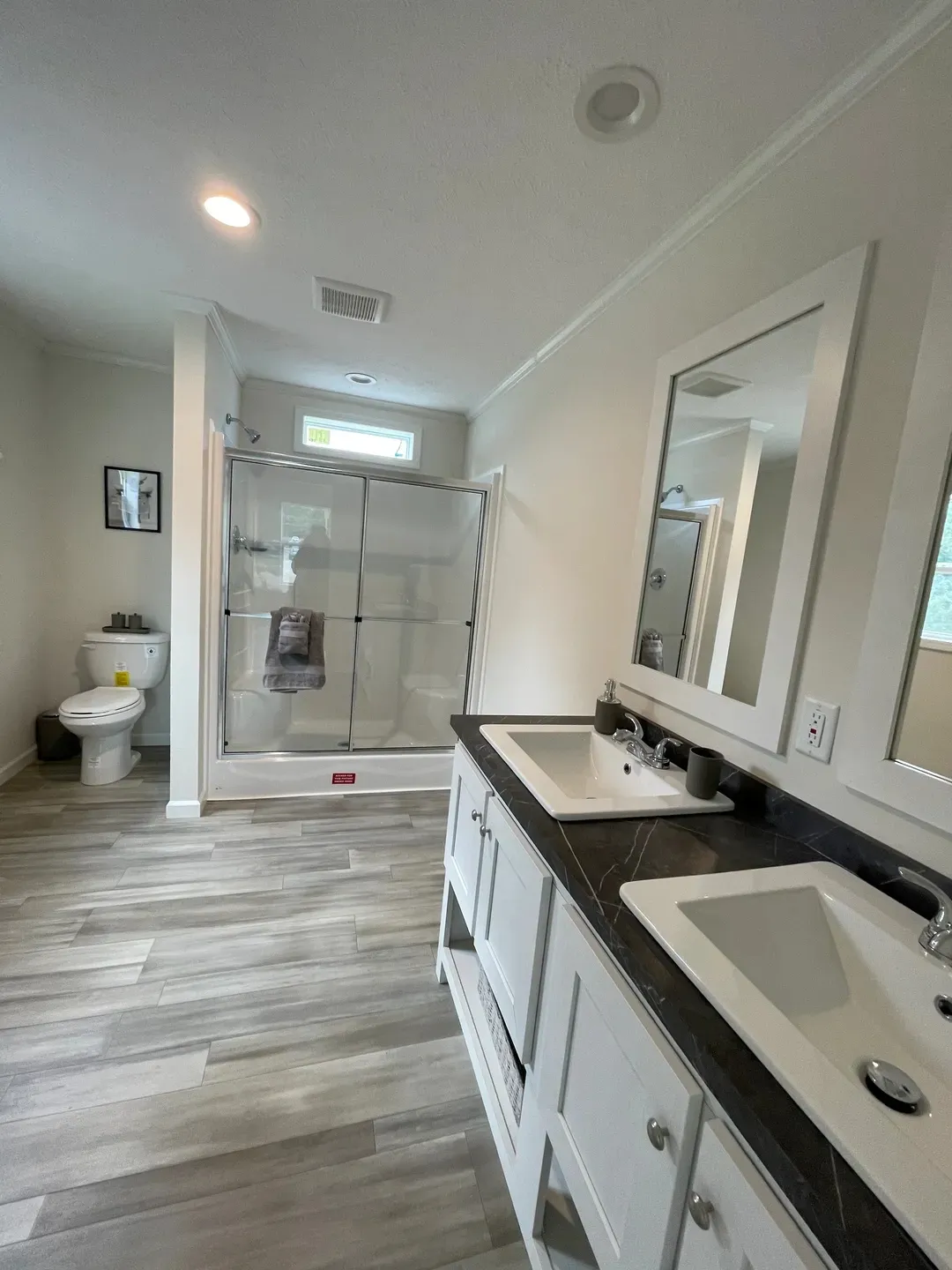 The MOONSTONE Primary Bathroom. This Manufactured Mobile Home features 3 bedrooms and 2 baths.