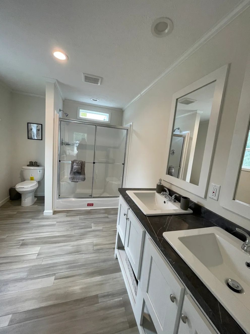 The MOONSTONE Primary Bathroom. This Manufactured Mobile Home features 3 bedrooms and 2 baths.