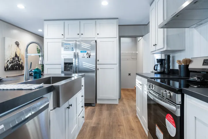 The RESOLUTION 16763X Kitchen. This Manufactured Mobile Home features 3 bedrooms and 2 baths.