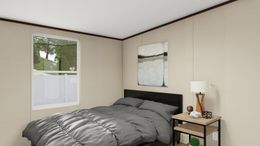 The EXCITEMENT Guest Bedroom. This Manufactured Mobile Home features 3 bedrooms and 2 baths.