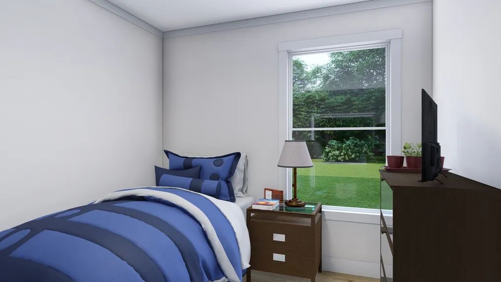 The LOVELY DAY Guest Bedroom. This Manufactured Mobile Home features 4 bedrooms and 2 baths.