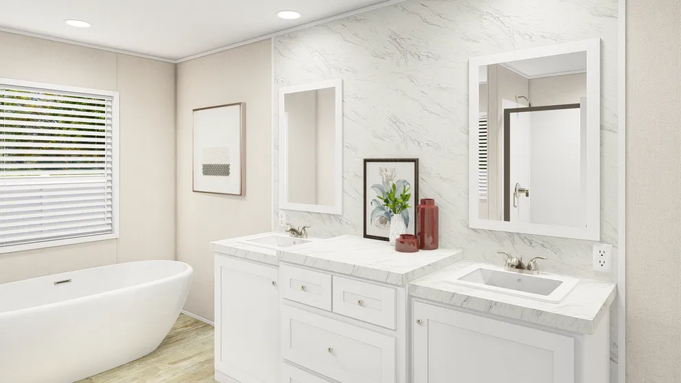 The GRAND LIVING 76 Primary Bathroom. This Manufactured Mobile Home features 4 bedrooms and 2 baths.