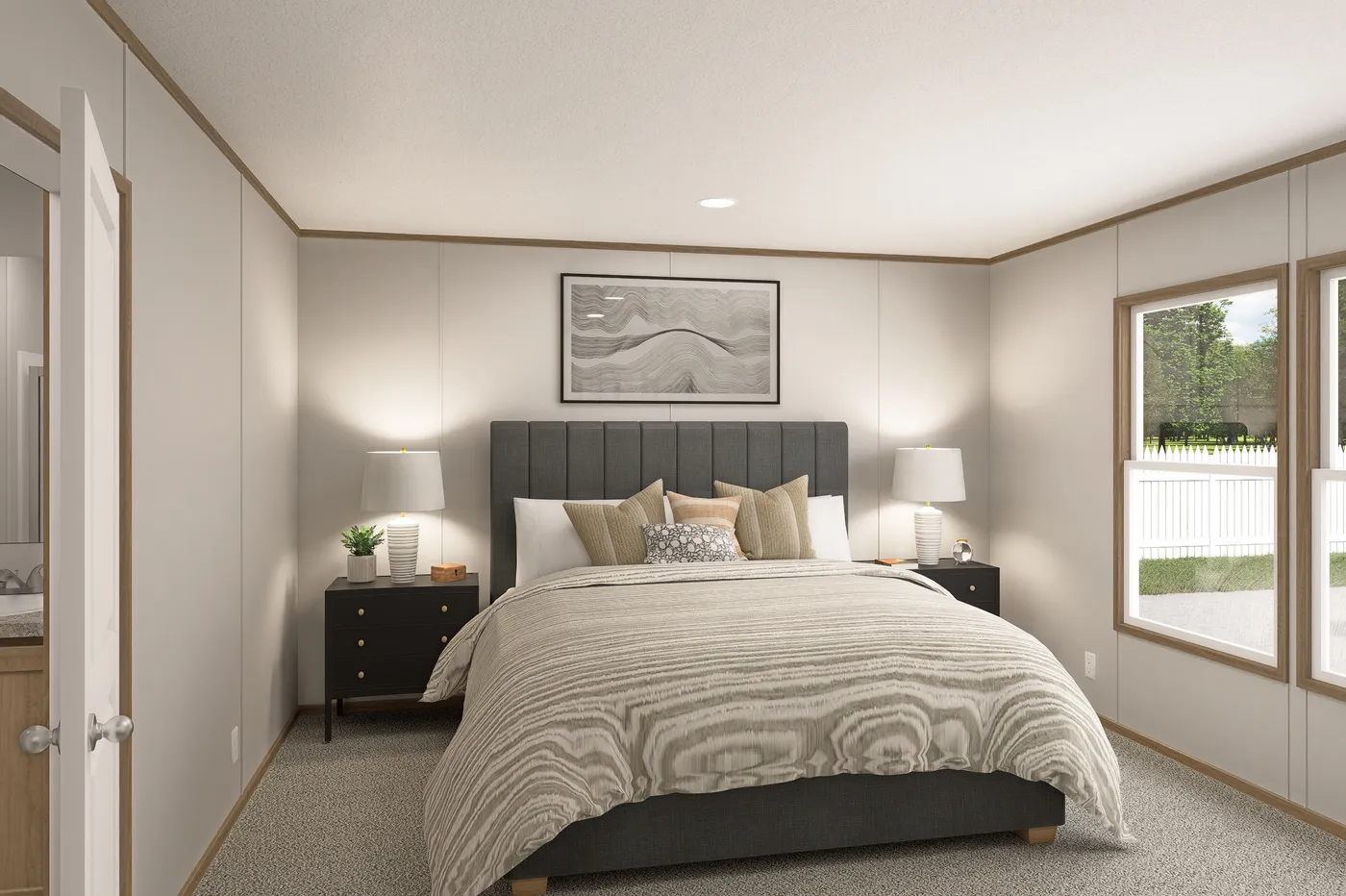 The THE EAGLE 60 Primary Bedroom. This Manufactured Mobile Home features 3 bedrooms and 2 baths.