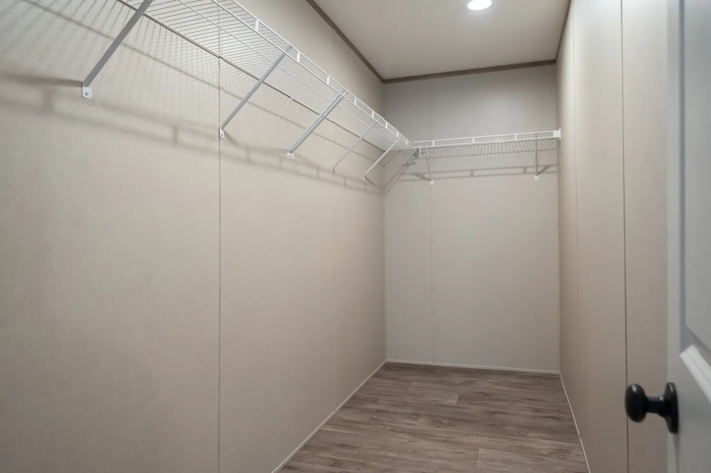 The PT 78 Primary Bedroom. This Manufactured Mobile Home features 3 bedrooms and 2 baths.