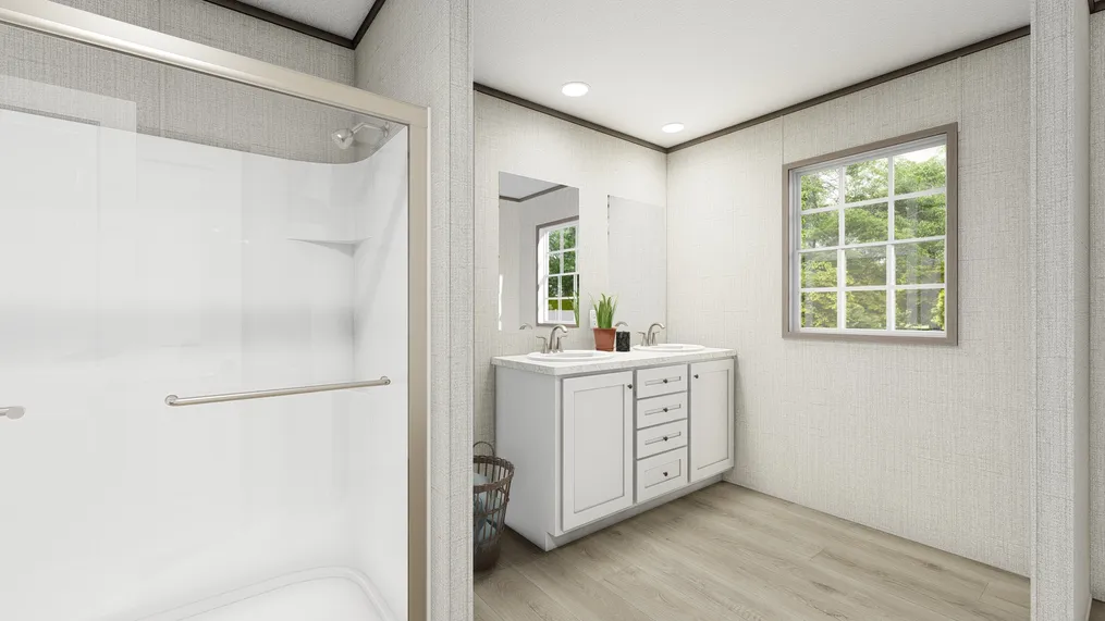 The LEGEND 28X56 COASTAL BREEZE II Primary Bathroom. This Manufactured Mobile Home features 3 bedrooms and 2 baths.