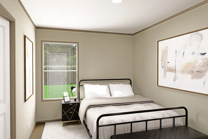 The RAINIER Guest Bedroom. This Manufactured Mobile Home features 4 bedrooms and 3 baths.