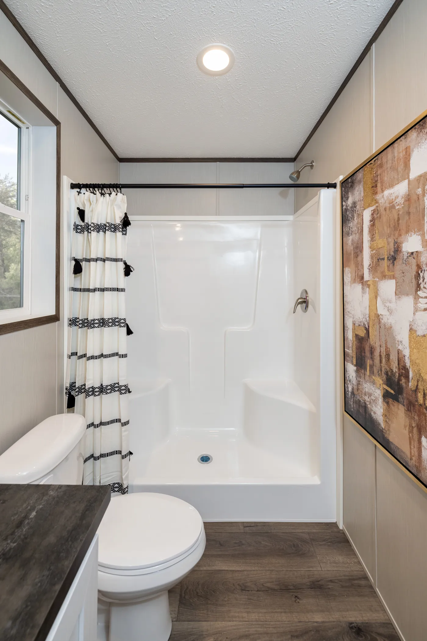 The INTUITION Guest Bathroom. This Manufactured Mobile Home features 3 bedrooms and 2 baths.