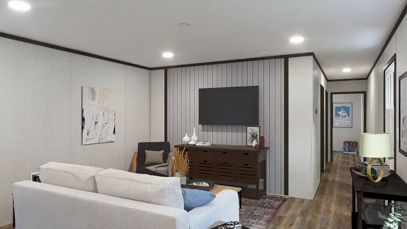 The DESIRE Living Room. This Manufactured Mobile Home features 3 bedrooms and 2 baths.