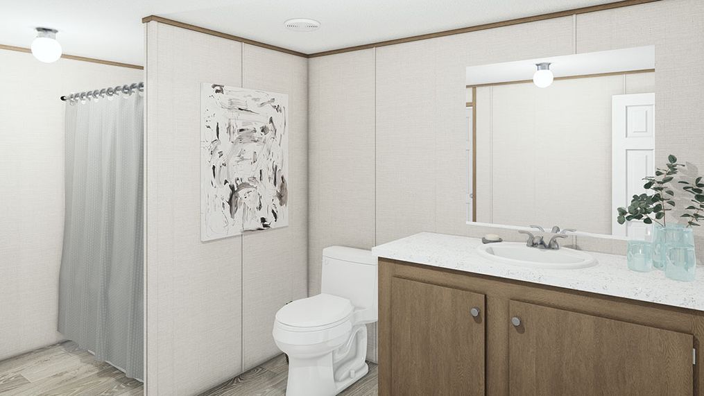 The MARVELOUS 3 Primary Bathroom. This Manufactured Mobile Home features 3 bedrooms and 2 baths.