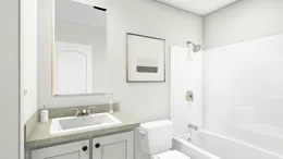 The UNDER PRESSURE Guest Bathroom. This Manufactured Mobile Home features 3 bedrooms and 2 baths.