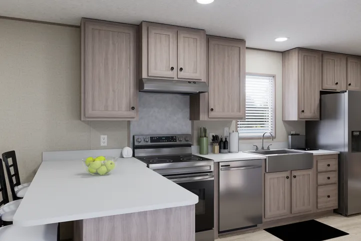 The THE ANNIVERSARY 76 Kitchen. This Manufactured Mobile Home features 3 bedrooms and 2 baths.
